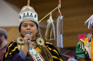 Miss Warm Springs Suzanne Slockish introduces herself at the recent Lincoln's Day Powwow. Photo: Alyssa Macy/Spilyay Tymoo.